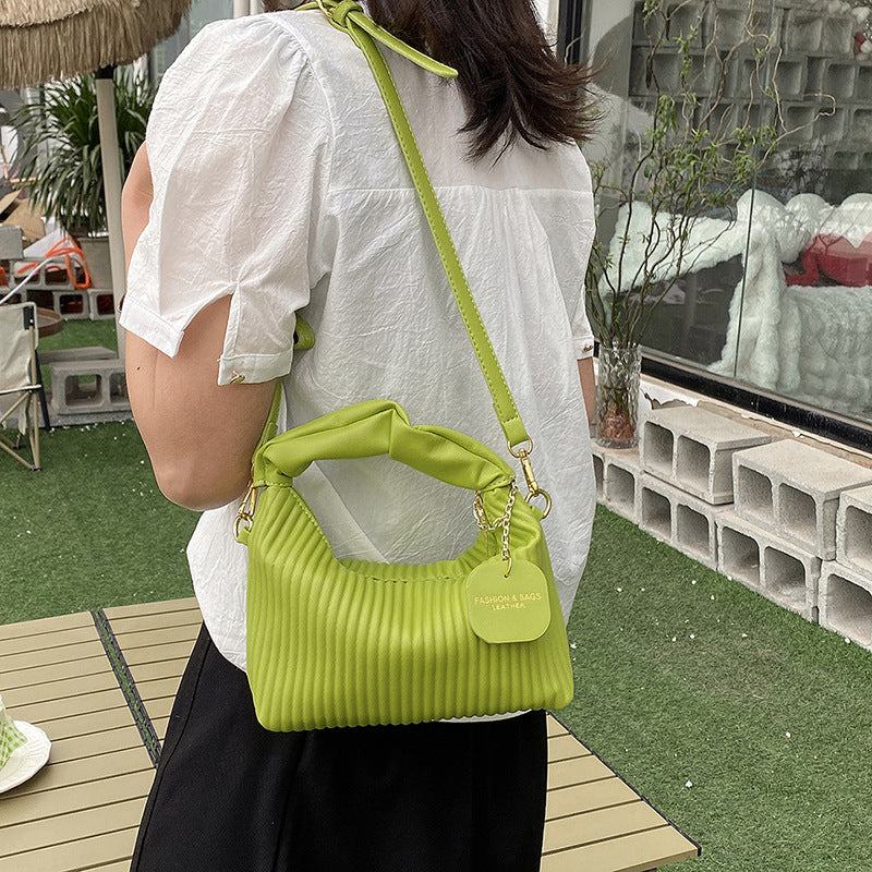 Green pleated PU leather women fashion crossbody bag with adjustable strap and compact design