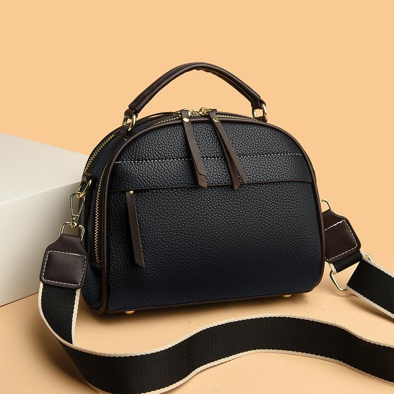 Black portable spring and summer women's bag with textured PU material and adjustable shoulder strap