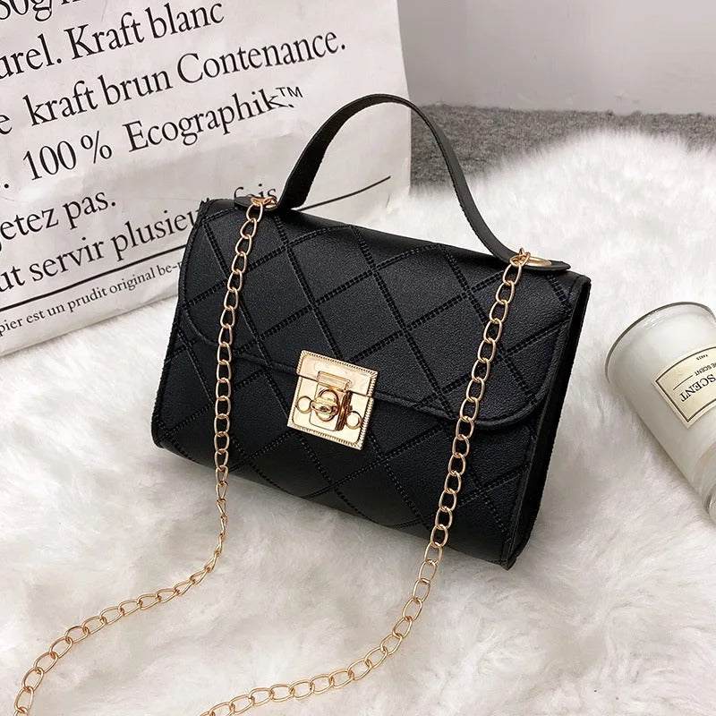 Black PU leather casual chain crossbody bag for women with gold lock clasp and quilted pattern