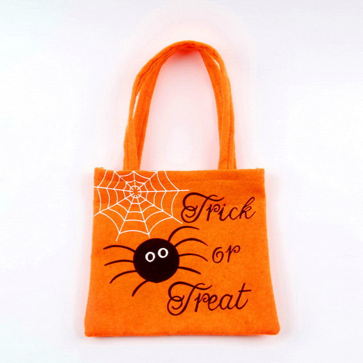 Orange Halloween Spider Pumpkin Print shoulder bag with "Trick or Treat" text and spider web design