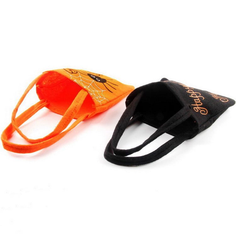 Two small Halloween-themed fabric shoulder bags in orange and black with spider and pumpkin prints designed for children’s candy gifts and handbags.