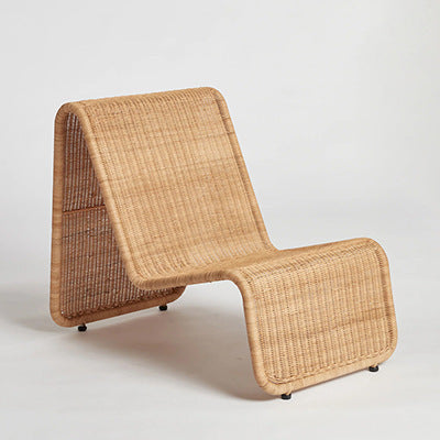 Outdoor rattan chair with curved design for balcony or garden leisure seating