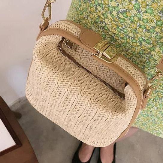 Small straw crossbody bag with beige knitting and gold buckle, casual summer handbag for women.