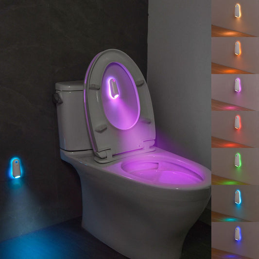 Toilet Night Light with motion sensor illuminating toilet bowl in multiple RGB colors for bathroom safety and decoration