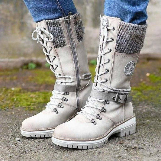 Winter high square heel plus size martin boots with round head, sewing line, knitted cuff, and side zipper in light beige color.