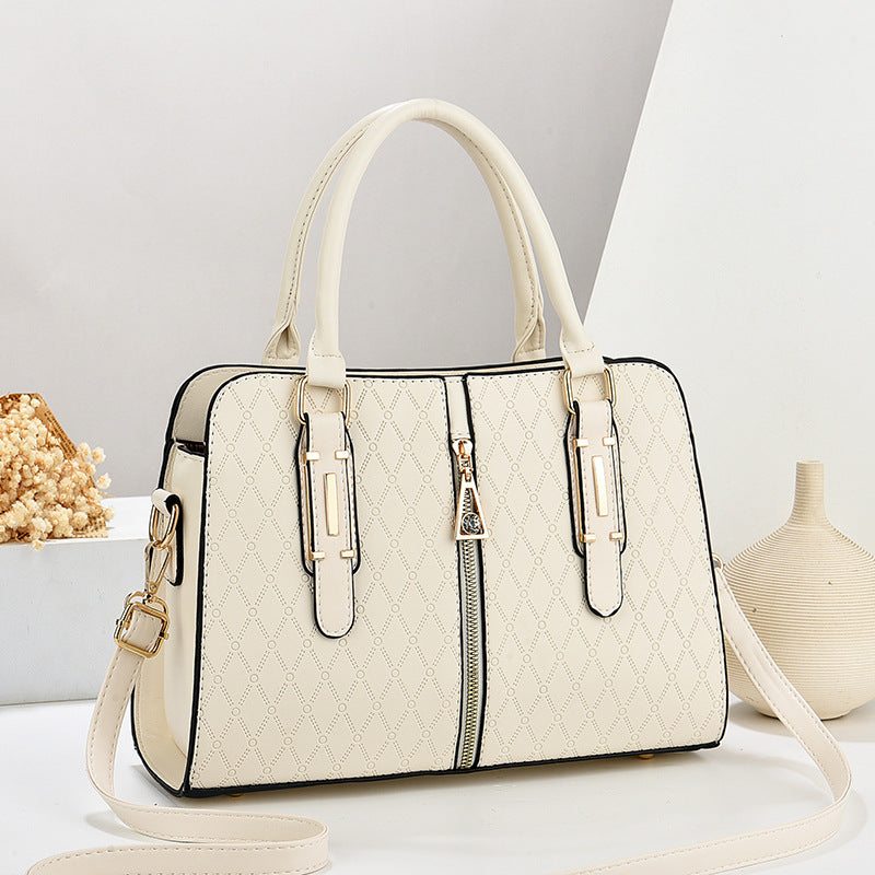 Elegant cream fashion color matching ladies handbag with large capacity and embossed design