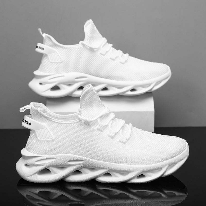 White breathable men's sports shoes with lightweight twisted soles and modern design