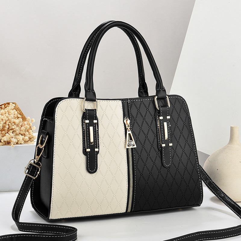 Fashion color matching ladies handbag with large capacity, black and beige embossed design, zipper closure, and versatile carry options.